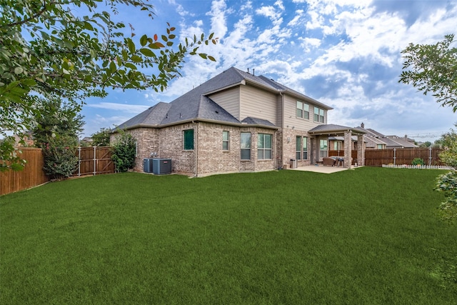 751 Devonshire Ct, Prosper, TX 75078 - back of house with a patio area, a fenced backyard, brick siding, and a shingled roof