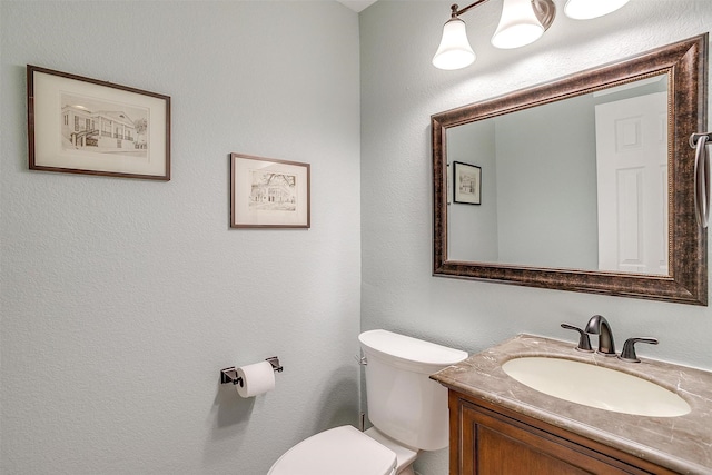 609 Huntington Ct, Grapevine, TX 76051 - bathroom with vanity and toilet