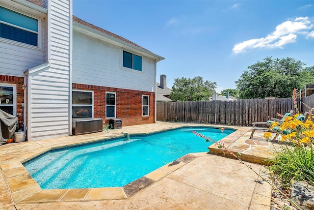 609 Huntington Ct, Grapevine, TX 76051 - view of swimming pool with a patio area, a fenced backyard, and area for grilling