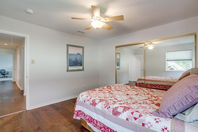 609 Huntington Ct, Grapevine, TX 76051 - bedroom with dark wood-type flooring, ceiling fan, and a closet