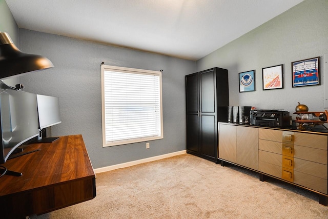 5712 Hudson St, Dallas, TX 75206 - home office featuring light colored carpet and baseboards