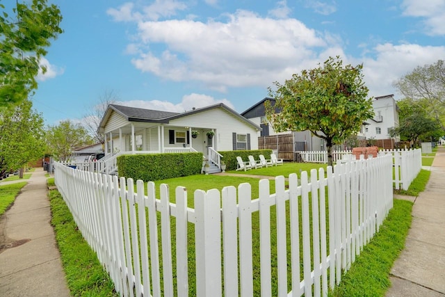 5712 Hudson St, Dallas, TX 75206 - bungalow featuring a porch and a fenced front yard