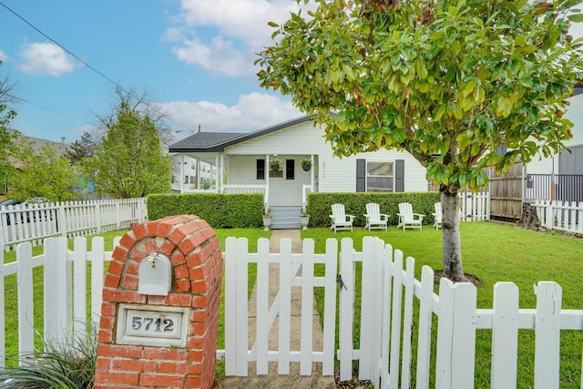 5712 Hudson St, Dallas, TX 75206 - view of front of house with a fenced front yard and a porch