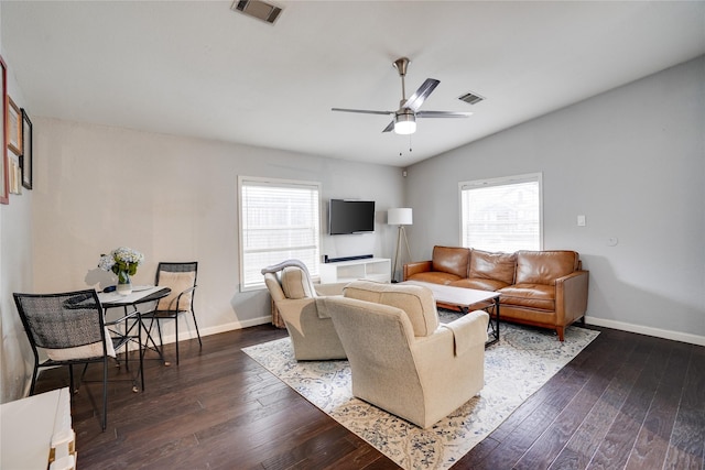 5712 Hudson St, Dallas, TX 75206 - living area with dark wood-type flooring, vaulted ceiling, and ceiling fan