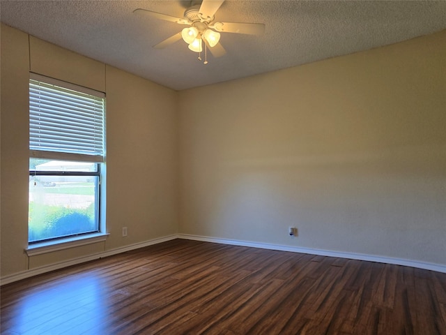 170 N Meadowbrook Dr, Pottsboro, TX 75076 - spare room featuring dark wood-style flooring, plenty of natural light, a textured ceiling, and a ceiling fan