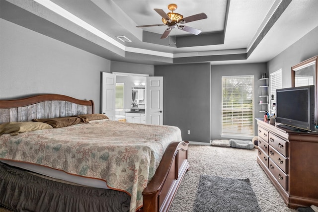 TBD Cleburne Highway, Granbury, TX 76049 - carpeted bedroom with a raised ceiling, ensuite bathroom, and ceiling fan