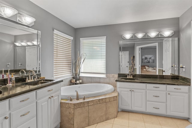 TBD Cleburne Highway, Granbury, TX 76049 - ensuite bathroom featuring two vanities, a bath, and tile patterned floors