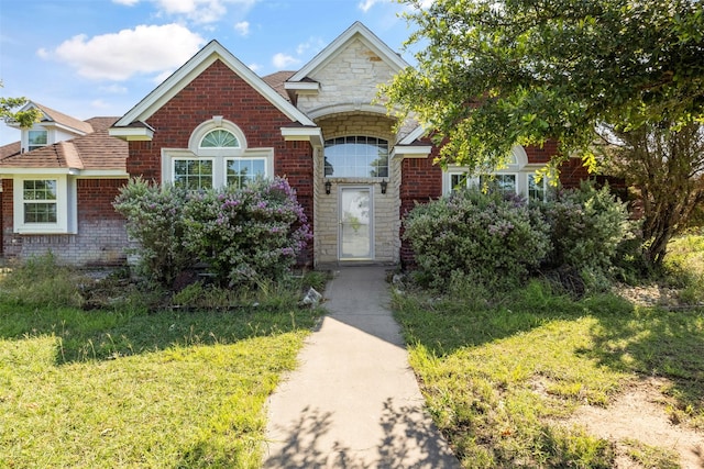 TBD Cleburne Highway, Granbury, TX 76049 - view of front facade featuring brick siding and stone siding
