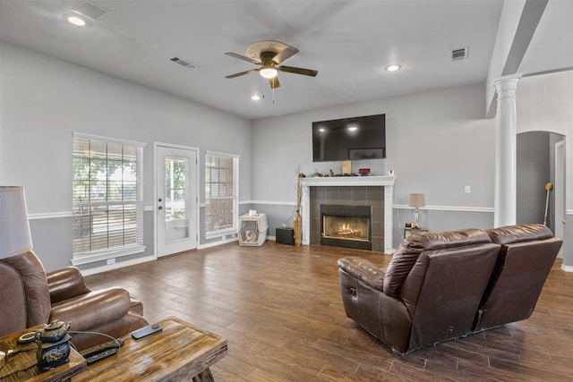 TBD Cleburne Highway, Granbury, TX 76049 - living area featuring ceiling fan, a fireplace, wood finished floors, ornate columns, and recessed lighting