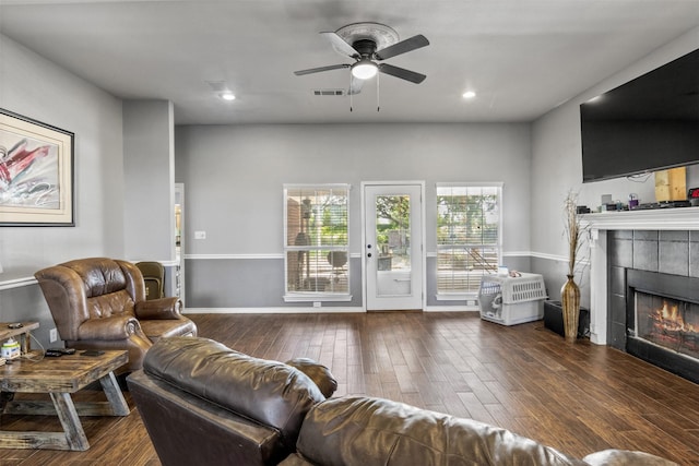 TBD Cleburne Highway, Granbury, TX 76049 - living area featuring hardwood / wood-style flooring, a tiled fireplace, a ceiling fan, and recessed lighting