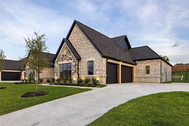 232 Bel Grand Rd, Haslet, TX 76052 - french country inspired facade featuring an attached garage, concrete driveway, brick siding, roof with shingles, and stone siding