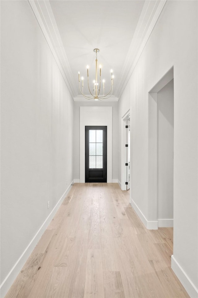 232 Bel Grand Rd, Haslet, TX 76052 - doorway with crown molding, a chandelier, and light wood-type flooring