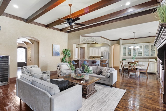 5101 Oak Timbers Ct, Colleyville, TX 76034 - living room featuring arched walkways, wine cooler, a ceiling fan, beam ceiling, and dark wood finished floors