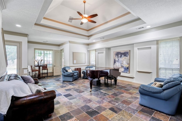 5101 Oak Timbers Ct, Colleyville, TX 76034 - living area with a ceiling fan, a raised ceiling, ornamental molding, and a decorative wall