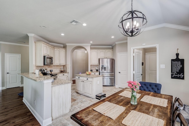 785 Crockett Dr, Lavon, TX 75166 - dining space featuring a chandelier, arched walkways, ornamental molding, and recessed lighting