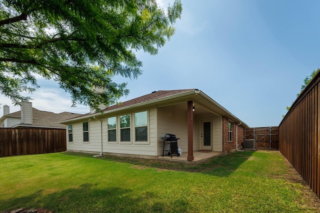 785 Crockett Dr, Lavon, TX 75166 - rear view of house with a fenced backyard, a patio, and a gate