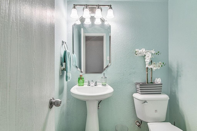 7400 Howling Coyote Ln, Fort Worth, TX 76131 - bathroom with toilet and a sink