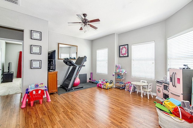 7400 Howling Coyote Ln, Fort Worth, TX 76131 - recreation room featuring light wood-style flooring and ceiling fan