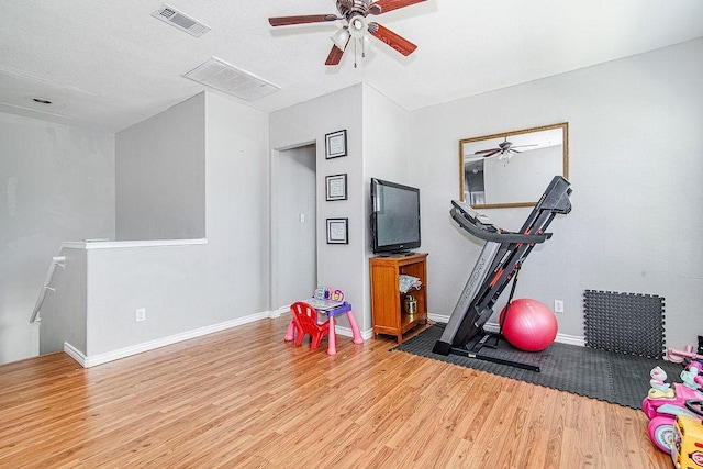 7400 Howling Coyote Ln, Fort Worth, TX 76131 - workout room featuring ceiling fan and wood finished floors