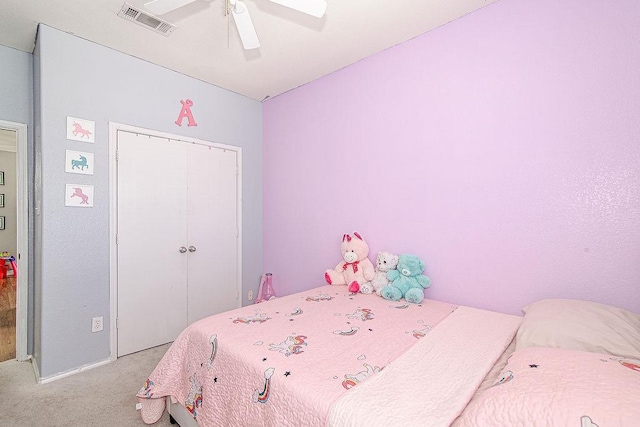 7400 Howling Coyote Ln, Fort Worth, TX 76131 - bedroom featuring light carpet, a closet, and a ceiling fan