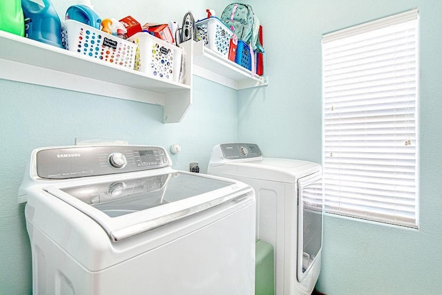 7400 Howling Coyote Ln, Fort Worth, TX 76131 - laundry area with washer and dryer and healthy amount of natural light