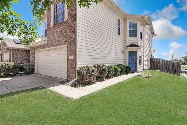 7400 Howling Coyote Ln, Fort Worth, TX 76131 - view of property exterior with a garage, brick siding, and driveway