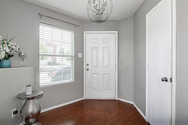 7400 Howling Coyote Ln, Fort Worth, TX 76131 - entryway featuring dark wood-style floors and a chandelier