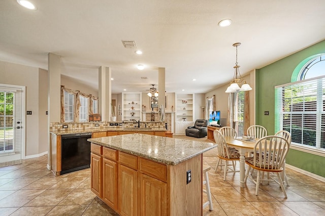 9513 Tiger Dr, Plano, TX 75025 - kitchen with dishwasher, a center island, plenty of natural light, open floor plan, and recessed lighting