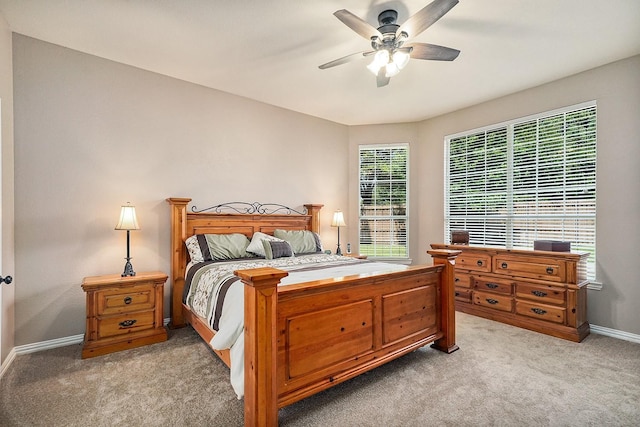 9513 Tiger Dr, Plano, TX 75025 - bedroom with light colored carpet and ceiling fan