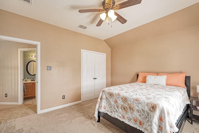 9513 Tiger Dr, Plano, TX 75025 - bedroom featuring light colored carpet, vaulted ceiling, ceiling fan, and a closet