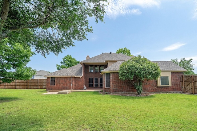 9513 Tiger Dr, Plano, TX 75025 - back of property with a patio, a fenced backyard, and brick siding