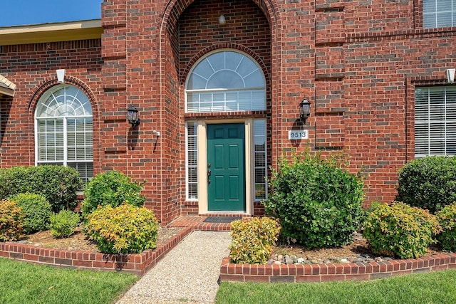 9513 Tiger Dr, Plano, TX 75025 - view of exterior entry with brick siding
