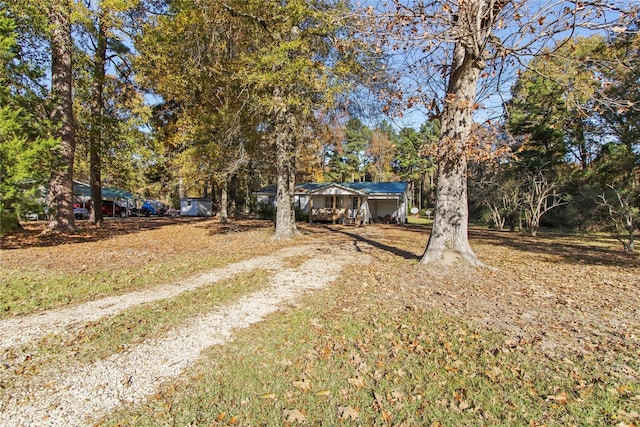1054 Frontage Rd, Minden, LA 71055 - view of front of house with driveway