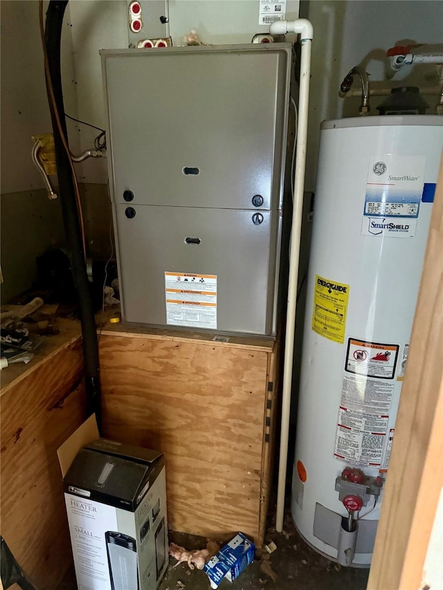 275 Lakeview Dr, Doyline, LA 71023 - utility room with water heater and heating unit
