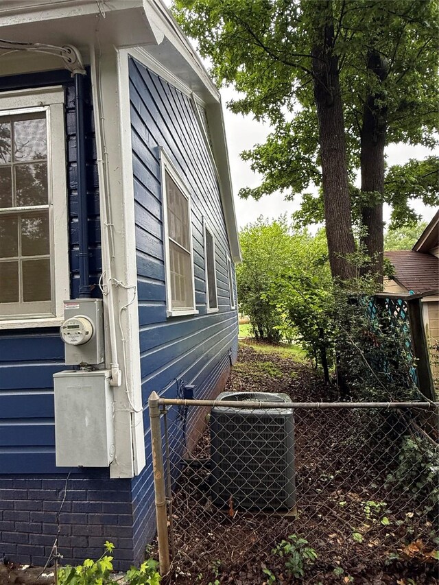 709 Highland Dr, Palestine, TX 75801 - view of property exterior featuring a central AC unit