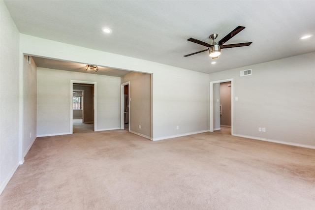 632 Sherwood Dr, Richardson, TX 75080 - spare room with light colored carpet, ceiling fan, and recessed lighting