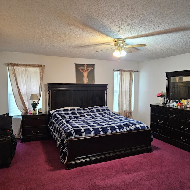 1026 Mazourka Dr, Arlington, TX 76001 - bedroom with dark carpet, a ceiling fan, and a textured ceiling