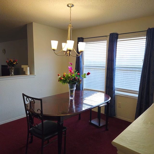 1026 Mazourka Dr, Arlington, TX 76001 - carpeted dining space with a chandelier, a textured ceiling, and plenty of natural light