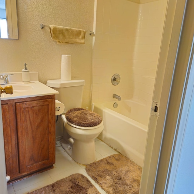 1026 Mazourka Dr, Arlington, TX 76001 - bathroom with vanity, a textured wall, tile patterned floors, and  shower combination