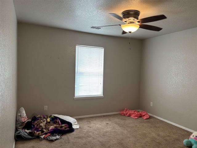 4052 Country Meadows Cir, Granbury, TX 76049 - game room with ceiling fan, carpet, and a textured ceiling