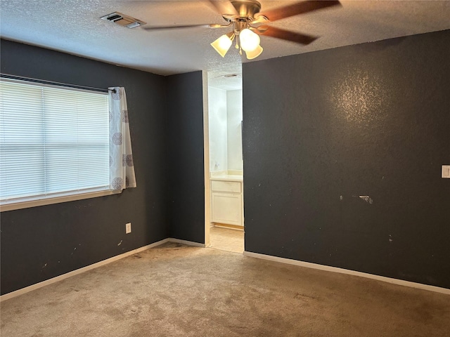 4052 Country Meadows Cir, Granbury, TX 76049 - carpeted empty room featuring a textured ceiling and a ceiling fan