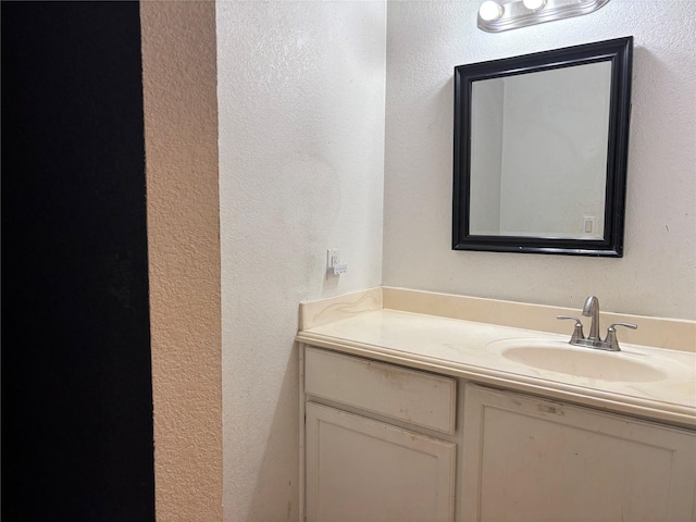 4052 Country Meadows Cir, Granbury, TX 76049 - bathroom with vanity and a textured wall
