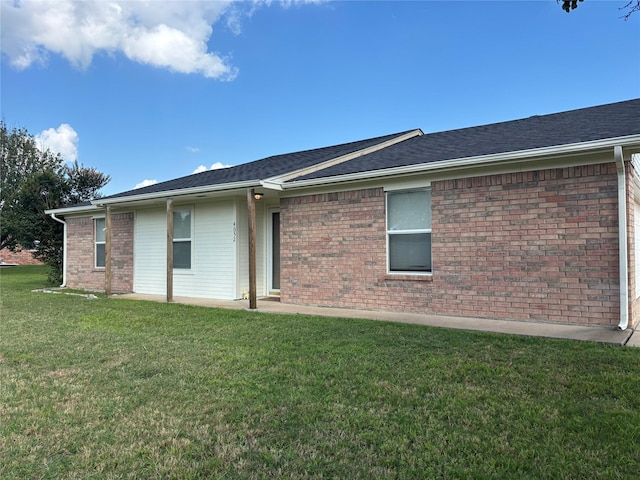 4052 Country Meadows Cir, Granbury, TX 76049 - back of house featuring a lawn and brick siding