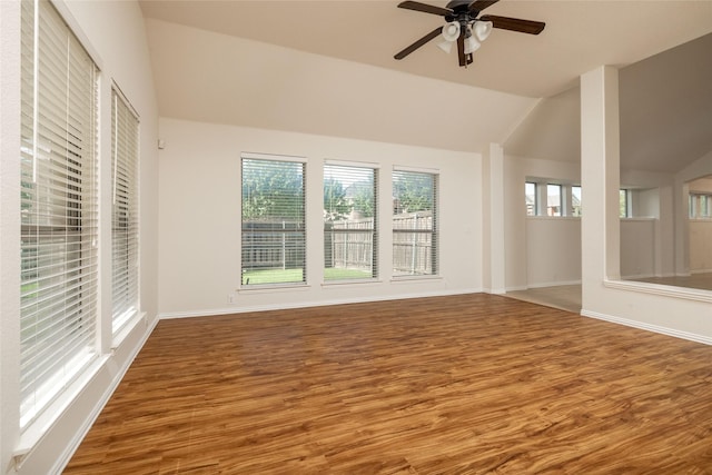 2401 Fawn Meadow Dr, Little Elm, TX 75068 - unfurnished living room with lofted ceiling, wood finished floors, and ceiling fan