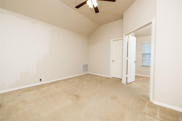 2401 Fawn Meadow Dr, Little Elm, TX 75068 - unfurnished bedroom with light colored carpet, lofted ceiling, and a ceiling fan