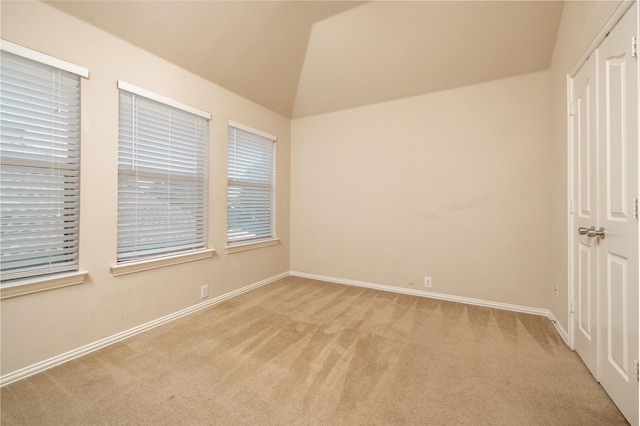 2401 Fawn Meadow Dr, Little Elm, TX 75068 - unfurnished bedroom featuring light carpet and lofted ceiling