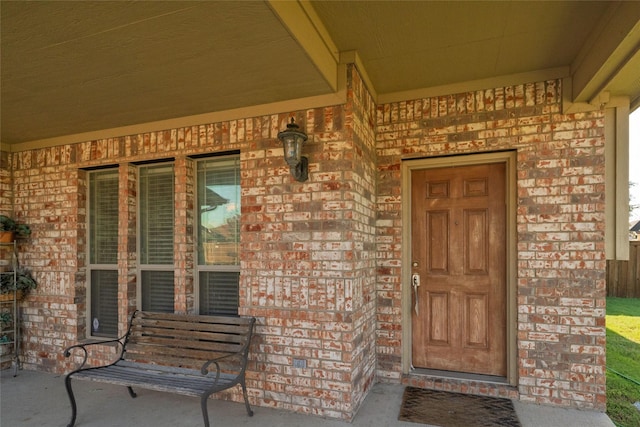 2401 Fawn Meadow Dr, Little Elm, TX 75068 - entrance to property featuring a porch and brick siding