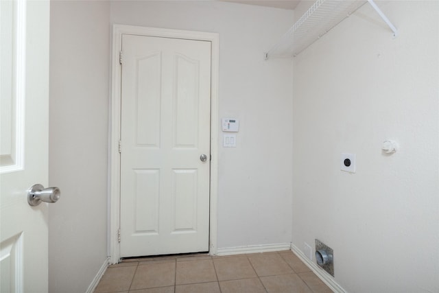 2401 Fawn Meadow Dr, Little Elm, TX 75068 - laundry room with hookup for an electric dryer and light tile patterned floors