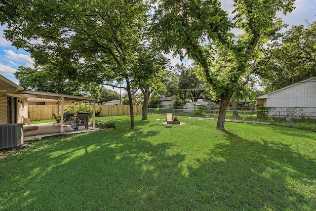 13835 Pyramid Dr, Farmers Branch, TX 75234 - fenced backyard with a patio area