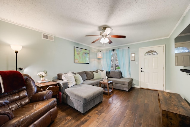 13835 Pyramid Dr, Farmers Branch, TX 75234 - living room featuring dark wood-style floors, a ceiling fan, crown molding, and a textured ceiling